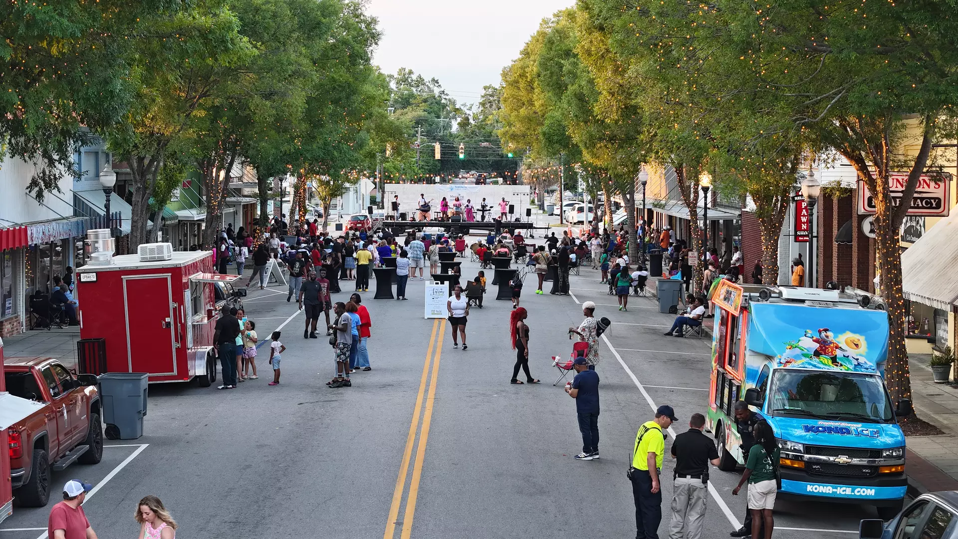 crowd on street watching a concert