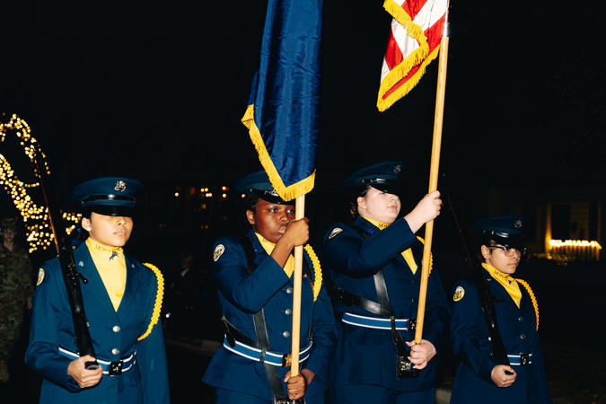Junior ROTC Color Guard holding flags